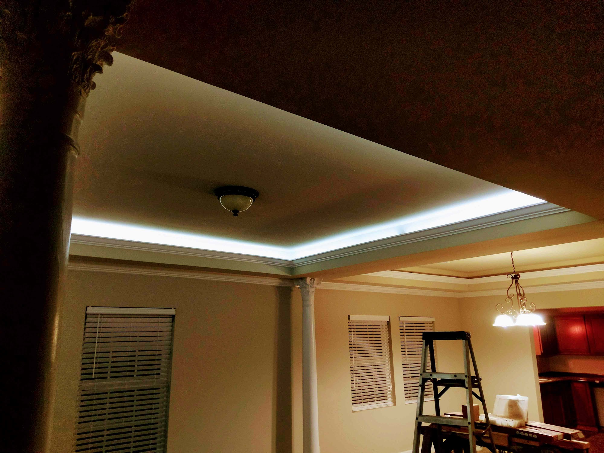 Finished room with recessed and accent lighting